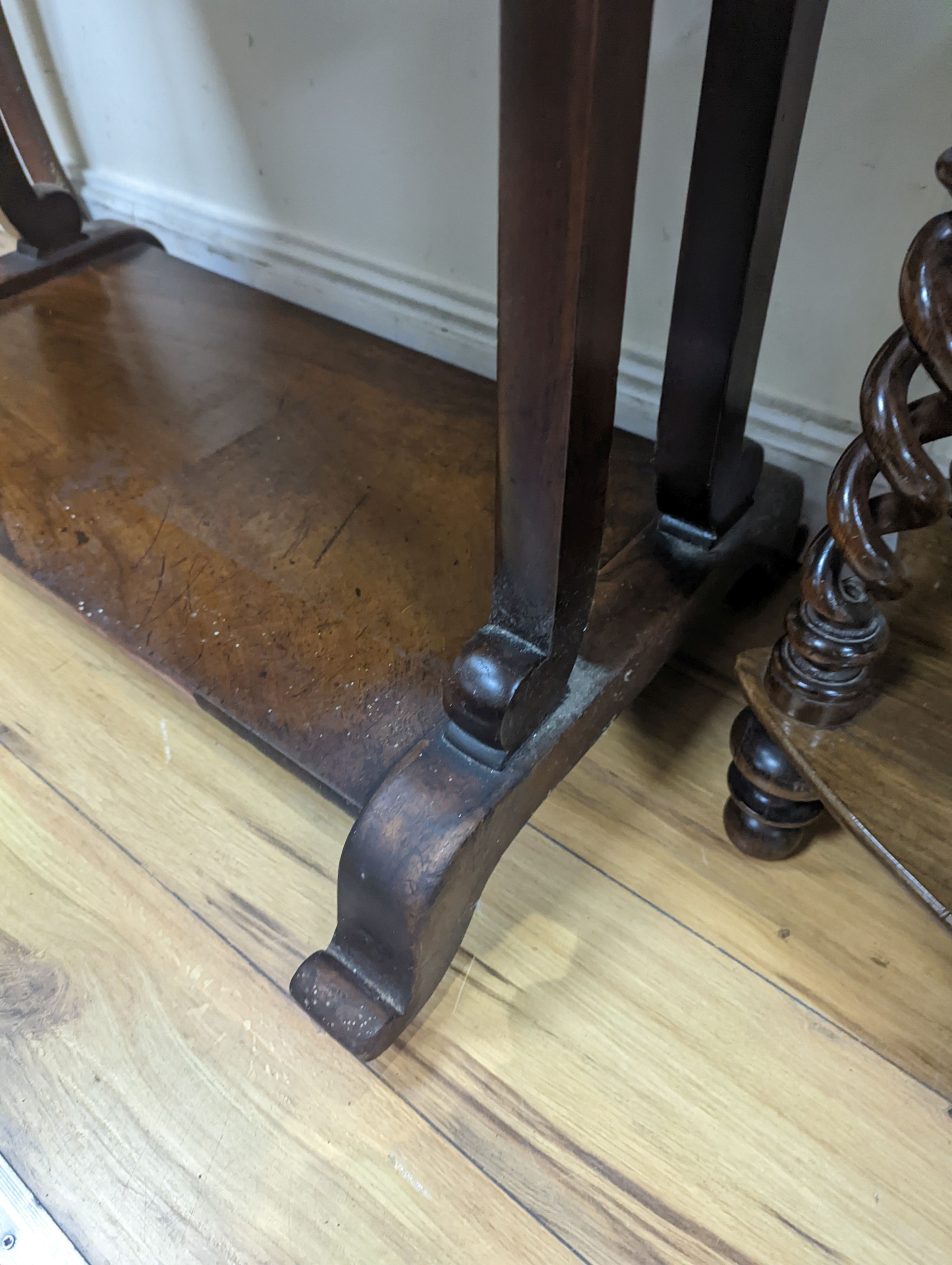 A Victorian rosewood three tier table. W-73cm, D-38cm, H-92cm.